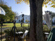 Reporters prepare for work at the White House post-Election Day, Wednesday, November 6, 2024, in Washington.