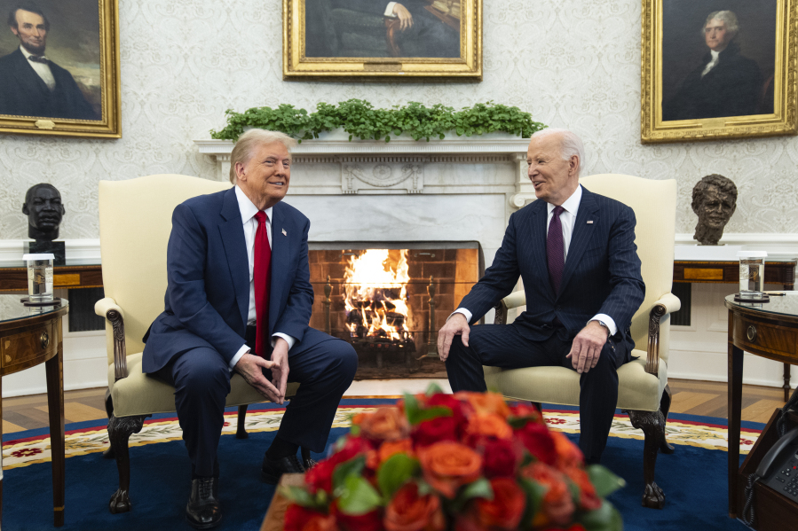 After delay, Trump signs agreement with Biden White House to begin