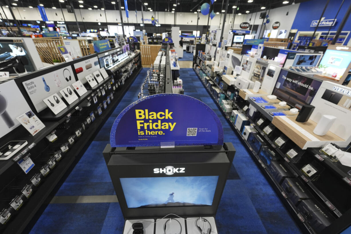 A sign promoting Black Friday is shown in a Best Buy store Thursday, Nov. 21, 2024, in south Denver.