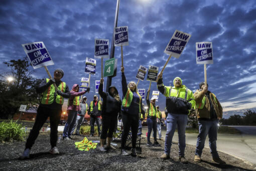 United Auto Workers members strike outside of Ford&#039;s Kentucky Truck Plant in Louisville, Ky., on Oct. 12, 2023.