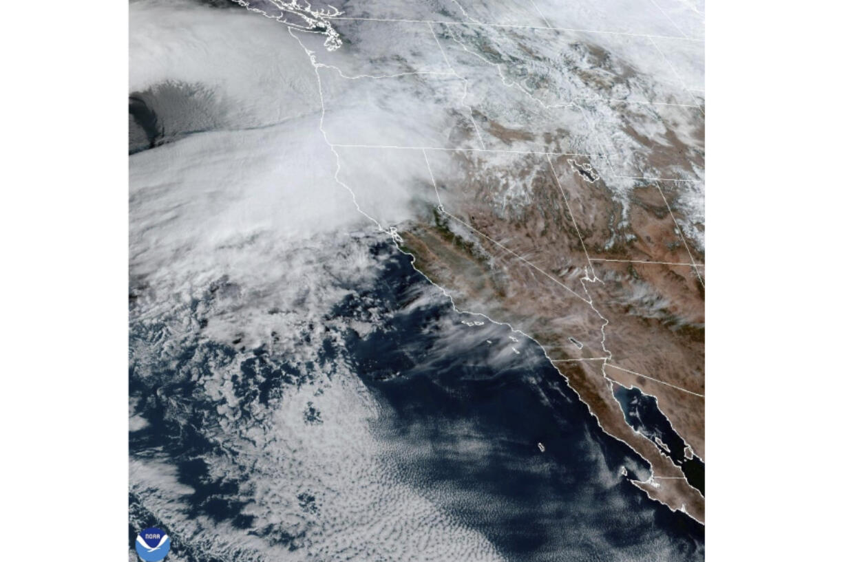 This satellite image taken, Nov. 19, 2024, and provided by NOAA, shows weather gathering in northern California and the Pacific Northwest.