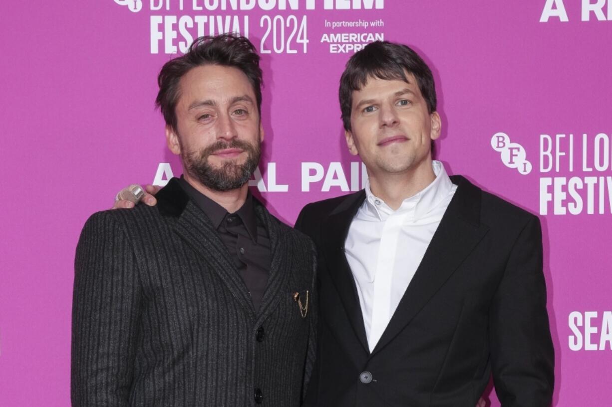 Kieran Culkin, left, and director Jesse Eisenberg pose for photographers Oct. 13 at the premiere of the film &ldquo;A Real Pain&rdquo; during the London Film Festival in London.