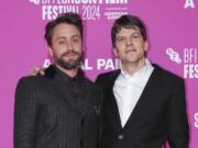 Kieran Culkin, left, and director Jesse Eisenberg pose for photographers Oct. 13 at the premiere of the film &ldquo;A Real Pain&rdquo; during the London Film Festival in London.