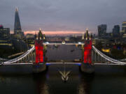 Tower Bridge in London lit up red for Remembrance Sunday, Nov. 10, 2024.