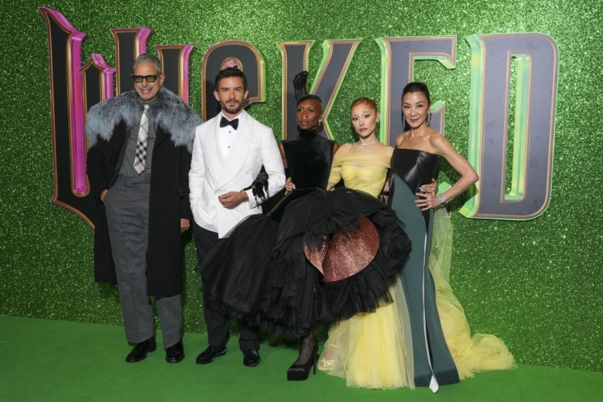 Jeff Goldblum, from left, Jonathan Bailey, Cynthia Erivo, Ariana Grande and Michelle Yeoh pose for photographers upon arrival at the premiere of the film &#039;Wicked&#039; on Monday, Nov. 18, 2024, in London.