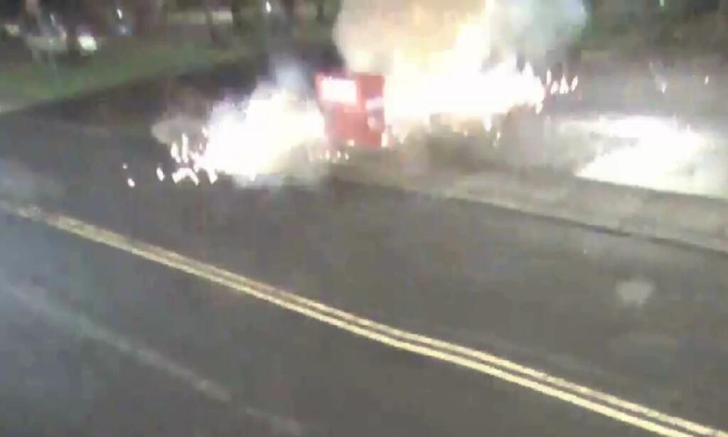 A screenshot from surveillance video shows the east Vancouver ballot box exploding into flames Oct.