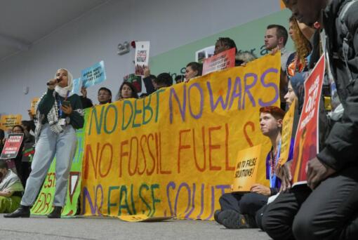 Activists participate in a demonstration against wars and fossil fuels at the COP29 U.N. Climate Summit, Friday, Nov. 15, 2024, in Baku, Azerbaijan.