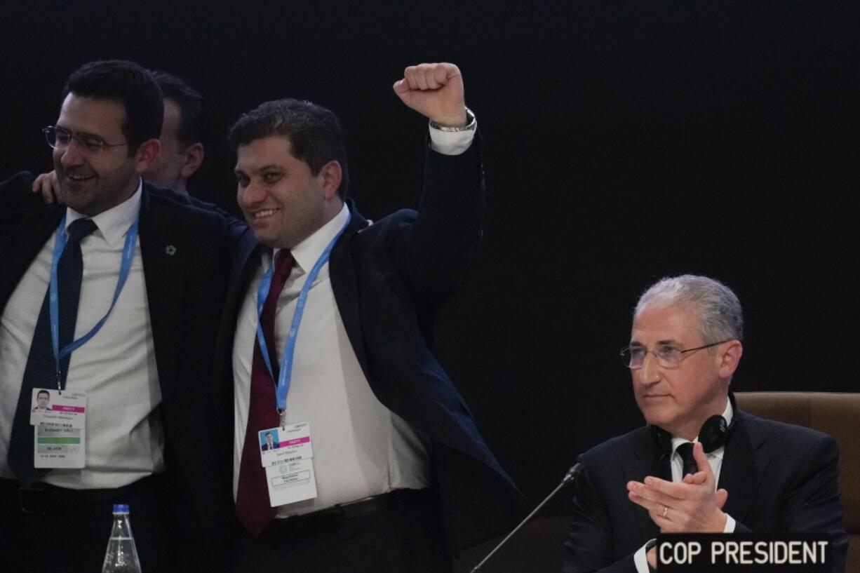 Mukhtar Babayev, COP29 President, applauds as he attends a closing plenary at the COP29 U.N. Climate Summit, Sunday, Nov. 24, 2024, in Baku, Azerbaijan.