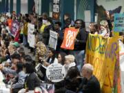 Activists participate in a demonstration at the COP29 U.N. Climate Summit, Saturday, Nov. 16, 2024, in Baku, Azerbaijan.