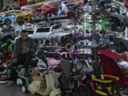 A vendor waits for customers at his store selling electric toy cars at the Yiwu wholesale market in Yiwu, east China&rsquo;s Zhejiang province on Nov. 8, 2024.