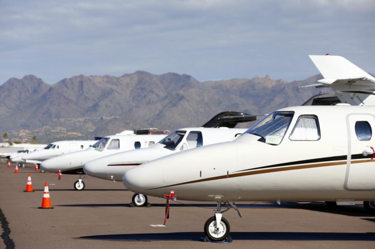 Private jets sit parked at Scottsdale Airport in Scottsdale, Ariz. (Ross D.