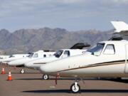 Private jets sit parked at Scottsdale Airport in Scottsdale, Ariz. (Ross D.