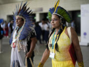 Members of Brazil&#039;s Indigenous delegation arrive to the opening ceremony of COP16, a United Nations&#039; biodiversity conference, in Cali, Colombia, Sunday, Oct. 20, 2024.