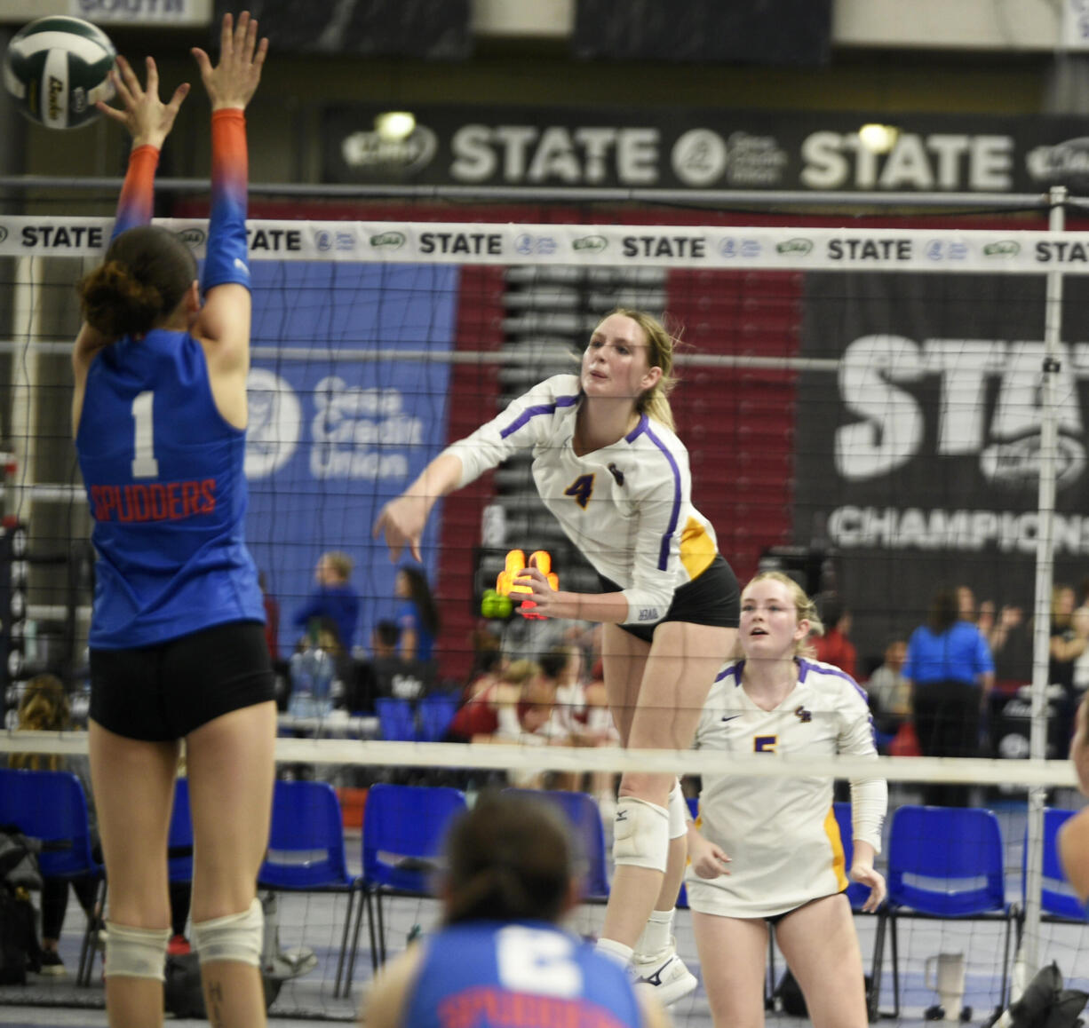 Columbia River's Sydney Dreves attempts a kill during a quarterfinal match against Ridgefield at the Class 2A state volleyball tournament on Friday, Nov. 15, 2024 in Yakima.