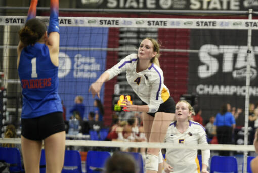 Columbia River's Sydney Dreves attempts a kill during a quarterfinal match against Ridgefield at the Class 2A state volleyball tournament on Friday, Nov. 15, 2024 in Yakima.