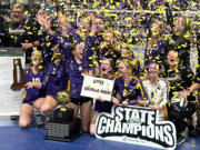 The Columbia River volleyball team celebrates its five-set victory over Ellensburg in the state championship match at the Class 2A state tournament on Saturday, Nov. 16, 2024 in Yakima.