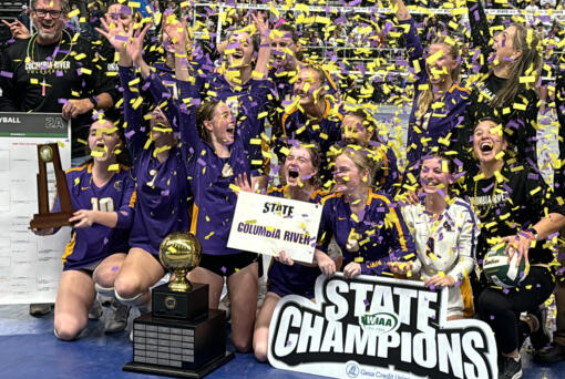 The Columbia River volleyball team celebrates its five-set victory over Ellensburg in the state championship match at the Class 2A state tournament on Saturday, Nov. 16, 2024 in Yakima.