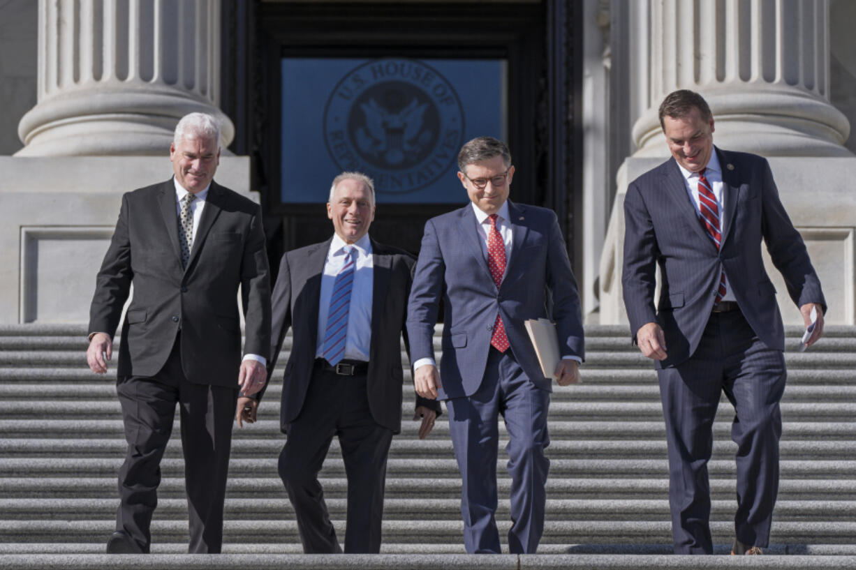 House Republican leaders, from left, Majority Whip Tom Emmer, R-Minn., Majority Leader Steve Scalise, R-La., Speaker of the House Mike Johnson, R-La., and Rep. Richard Hudson, R-N.C., chairman of the National Republican Congressional Committee, arrive to tout Republican wins and meet with reporters on the steps of the Capitol in Washington, Tuesday, Nov. 12, 2024. Congress returns to work this week to begin what is known as a lame-duck session &mdash; that period between Election Day and the end of the two-year congressional term. (AP Photo/J.