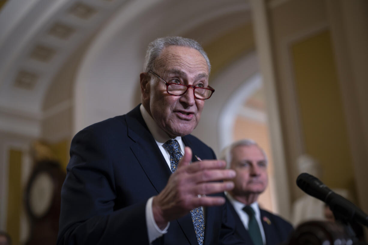 Senate Majority Leader Chuck Schumer, D-N.Y., speaks with reporters at the Capitol in Washington, Wednesday, Nov. 13, 2024. (AP Photo/J.