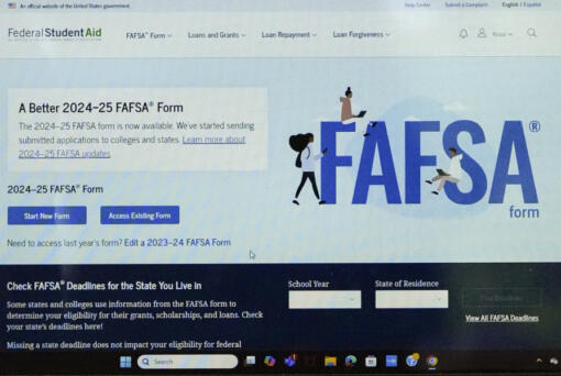 FILE - FAFSA website is seen on Adjovi Golo&rsquo;s laptop at DePaul University in Chicago, Aug. 28, 2024. (AP Photo/Nam Y.