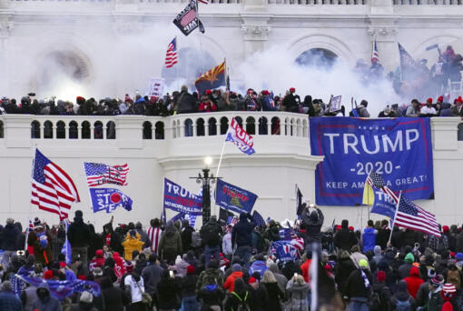 FILE - Rioters storm the West Front of the U.S. Capitol Jan. 6, 2021, in Washington.