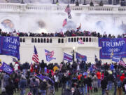 Rioters loyal to President Donald Trump storm the Capitol, Jan. 6, 2021, in Washington.