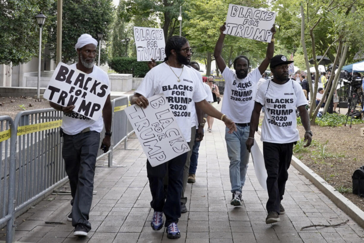 Supporters of former President Donald Trump gather Aug. 3, 2023, near the E. Barrett Prettyman U.S. Federal Courthouse in Washington, D.C.