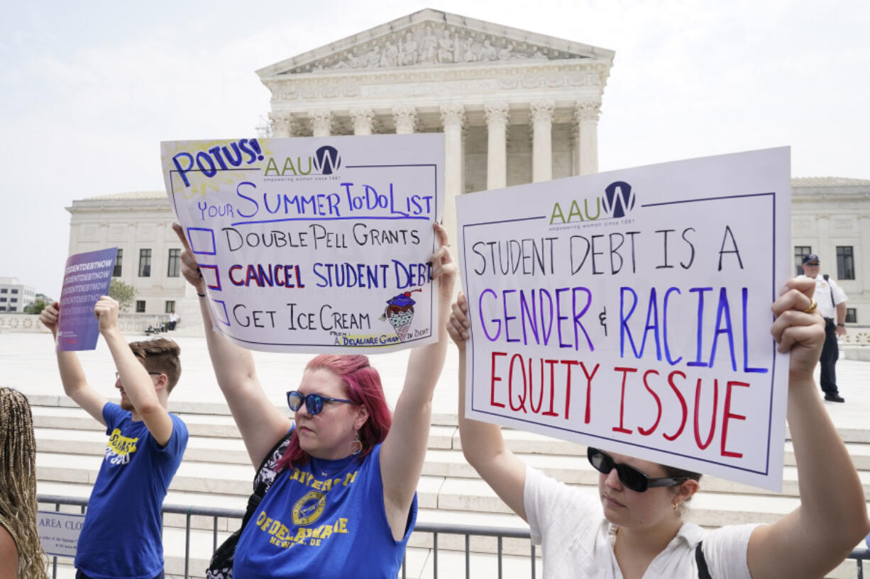 FILE - People demonstrate outside the Supreme Court, June 30, 2023, in Washington.