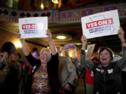 People at an election night watch party react after an abortion rights amendment to the Missouri constitution passed, Tuesday, Nov. 5, 2024, in Kansas City, Mo.