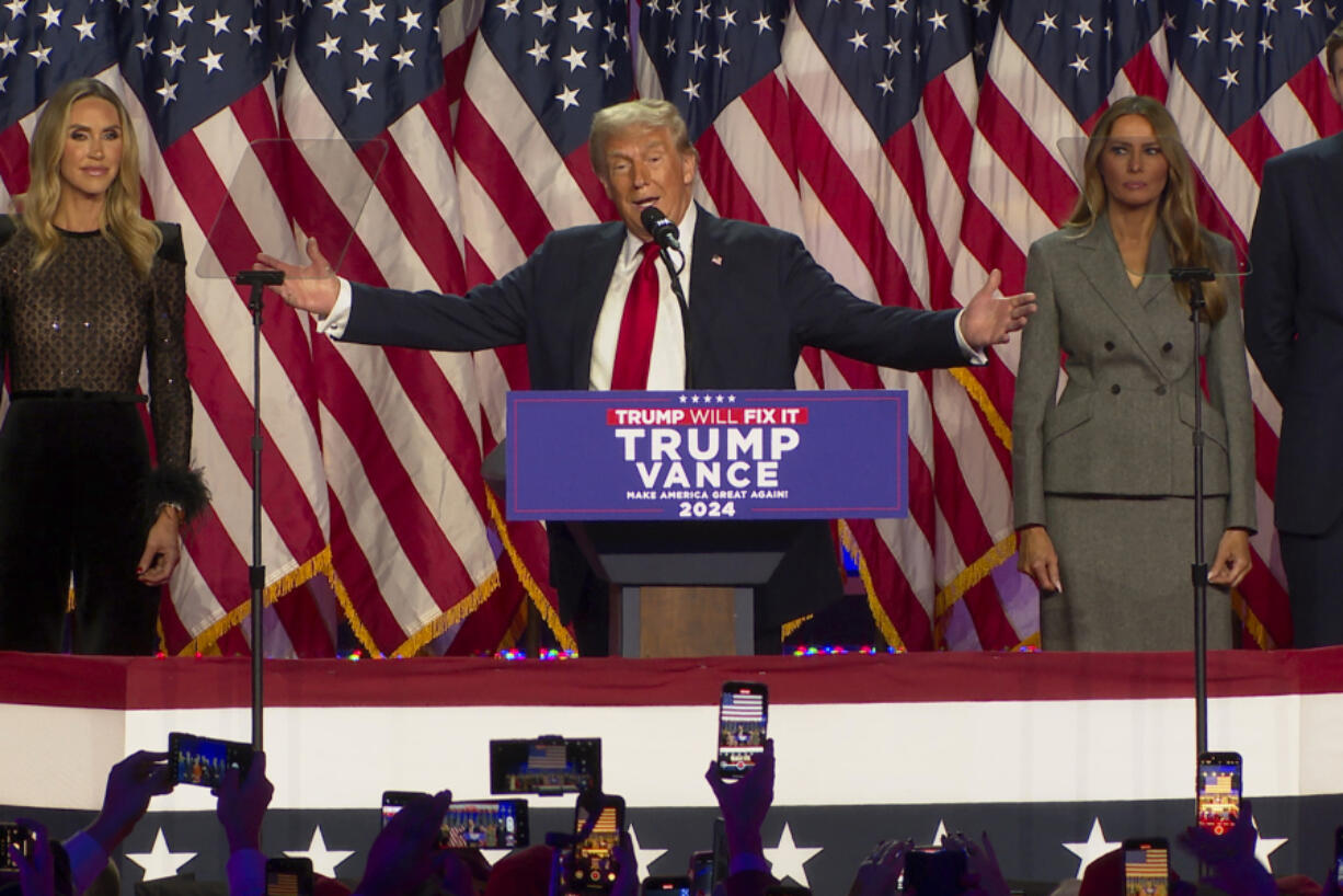 Republican presidential nominee former President Donald Trump speaks at an election results watch party as his commanding victory over Kamala Harris is apparent on Wednesday, Nov. 6, 2024, in West Palm Beach, Fla.