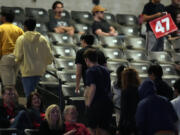 Supporters leave as Republican presidential nominee former President Donald Trump speaks at a campaign rally at McCamish Pavilion Monday, Oct. 28, 2024, in Atlanta.