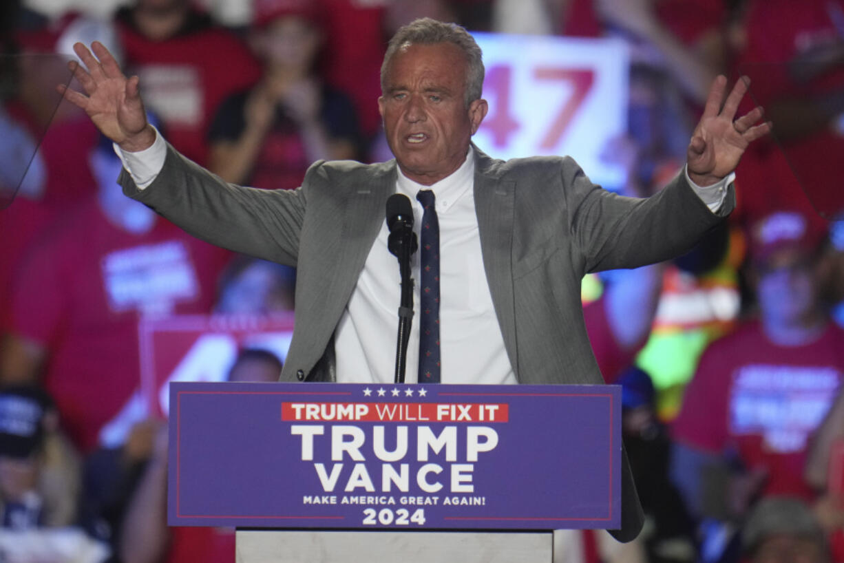 Robert F. Kennedy Jr., speaks before Republican presidential nominee former President Donald Trump at a campaign rally at Macomb Community College Friday, Nov. 1, 2024, in Warren, Mich.