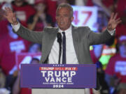 Robert F. Kennedy Jr., speaks before Republican presidential nominee former President Donald Trump at a campaign rally at Macomb Community College Friday, Nov. 1, 2024, in Warren, Mich.