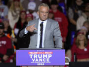 Robert F. Kennedy Jr., speaks before Republican presidential nominee former President Donald Trump at a campaign event Friday, Nov. 1, 2024, in Milwaukee.