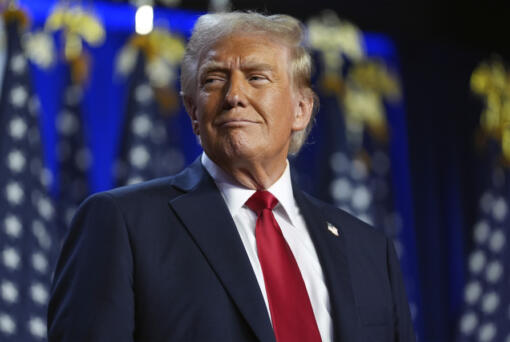 Republican presidential nominee former President Donald Trump arrives at an election night watch party at the Palm Beach Convention Center, Wednesday, Nov. 6, 2024, in West Palm Beach, Fla.