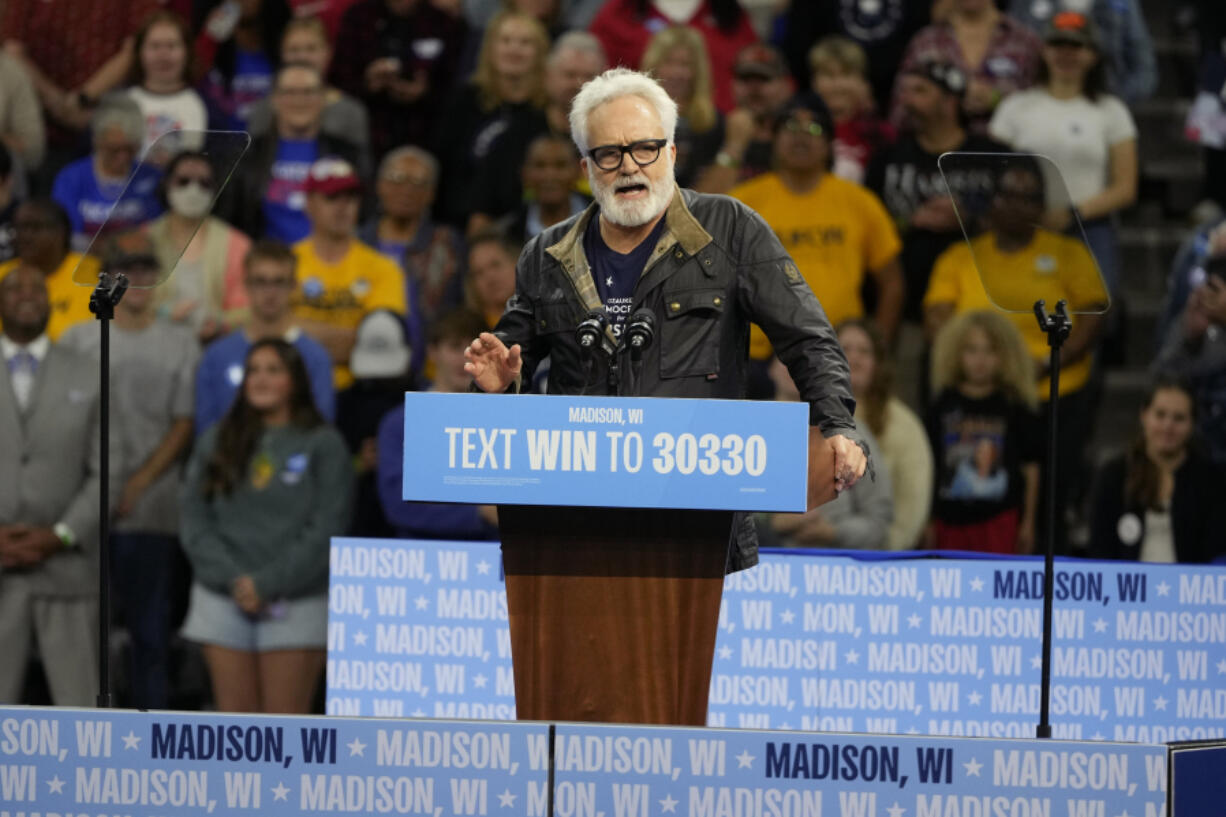 Actor Bradley Whitford speaks at a campaign event before Democratic vice presidential nominee Minnesota Gov. Tim Walz and former President Barack Obama, Tuesday, Oct. 22, 2024, in Madison, Wis.