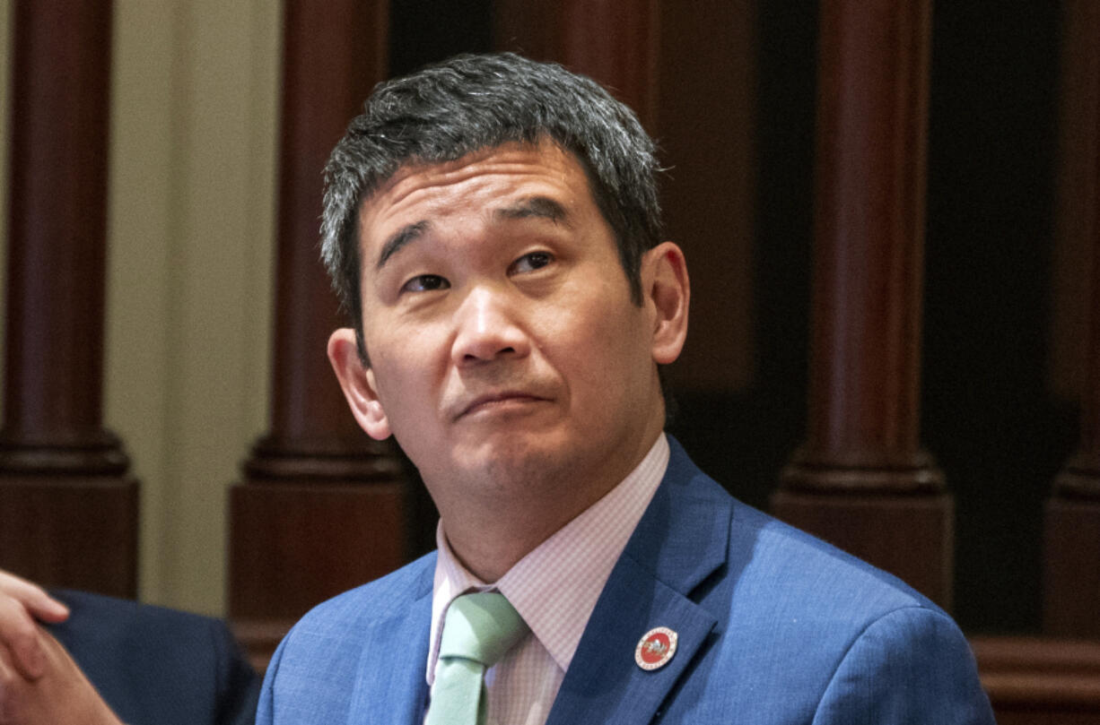 FILE - State Sen. Dave Min, D-Irvine, listens as lawmakers discuss a bill before the Senate at the Capitol in Sacramento, Calif., July 10, 2023.