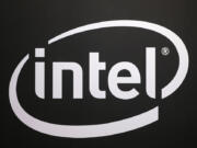 FILE -The logo of semiconductor chip maker Intel is pictured at the Paris games week in Paris, Nov. 4, 2017.