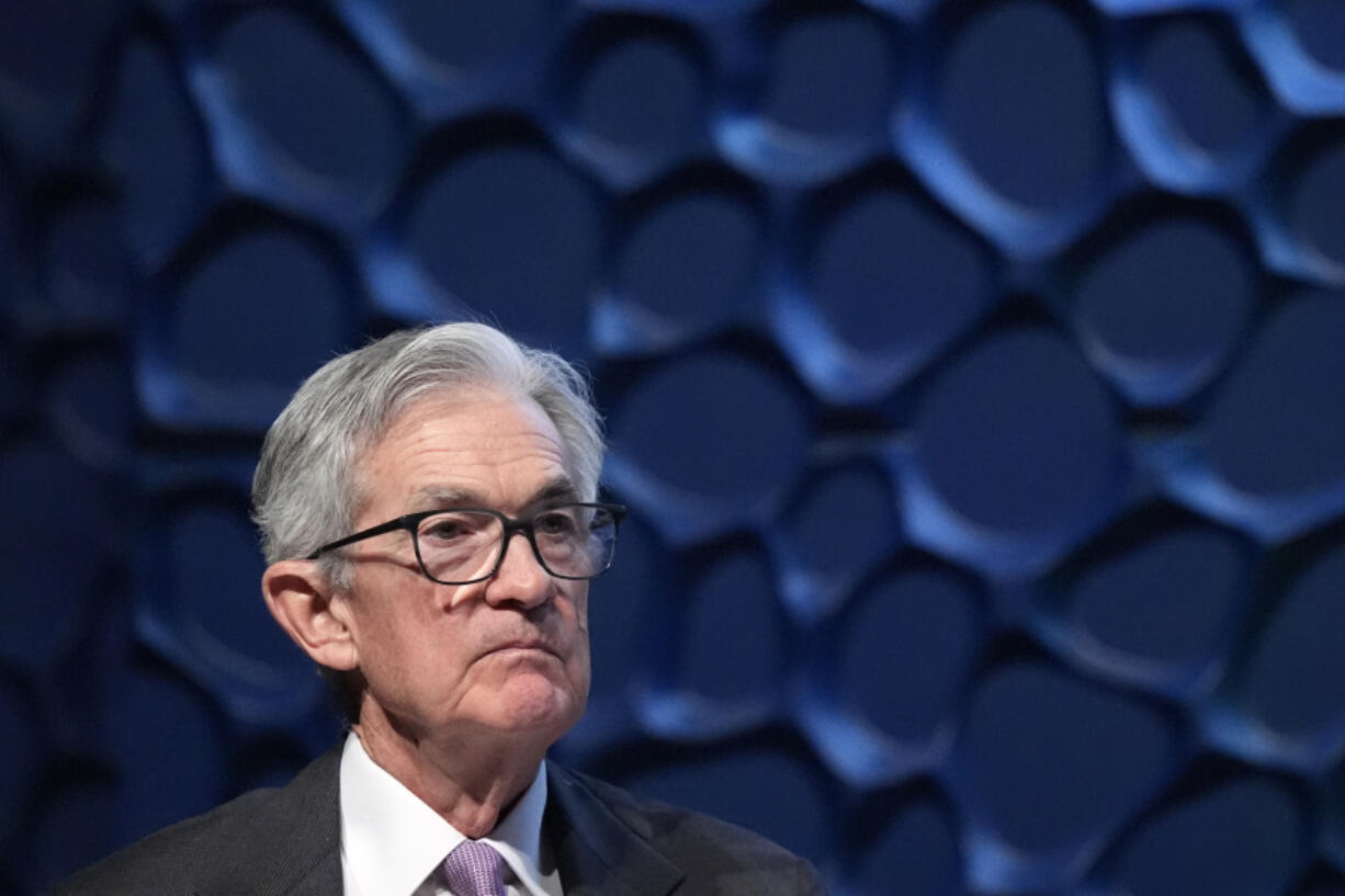 FILE - Federal Reserve Chair Jerome Powell listens to a question from a moderator during a Dallas Regional Chamber event in Music Hall at Fair Park Nov. 14, 2024, in Dallas.