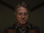 This image released by A24 shows Hugh Grant in a scene from &ldquo;Heretic.&rdquo; (Kimberley French/A24 via AP)