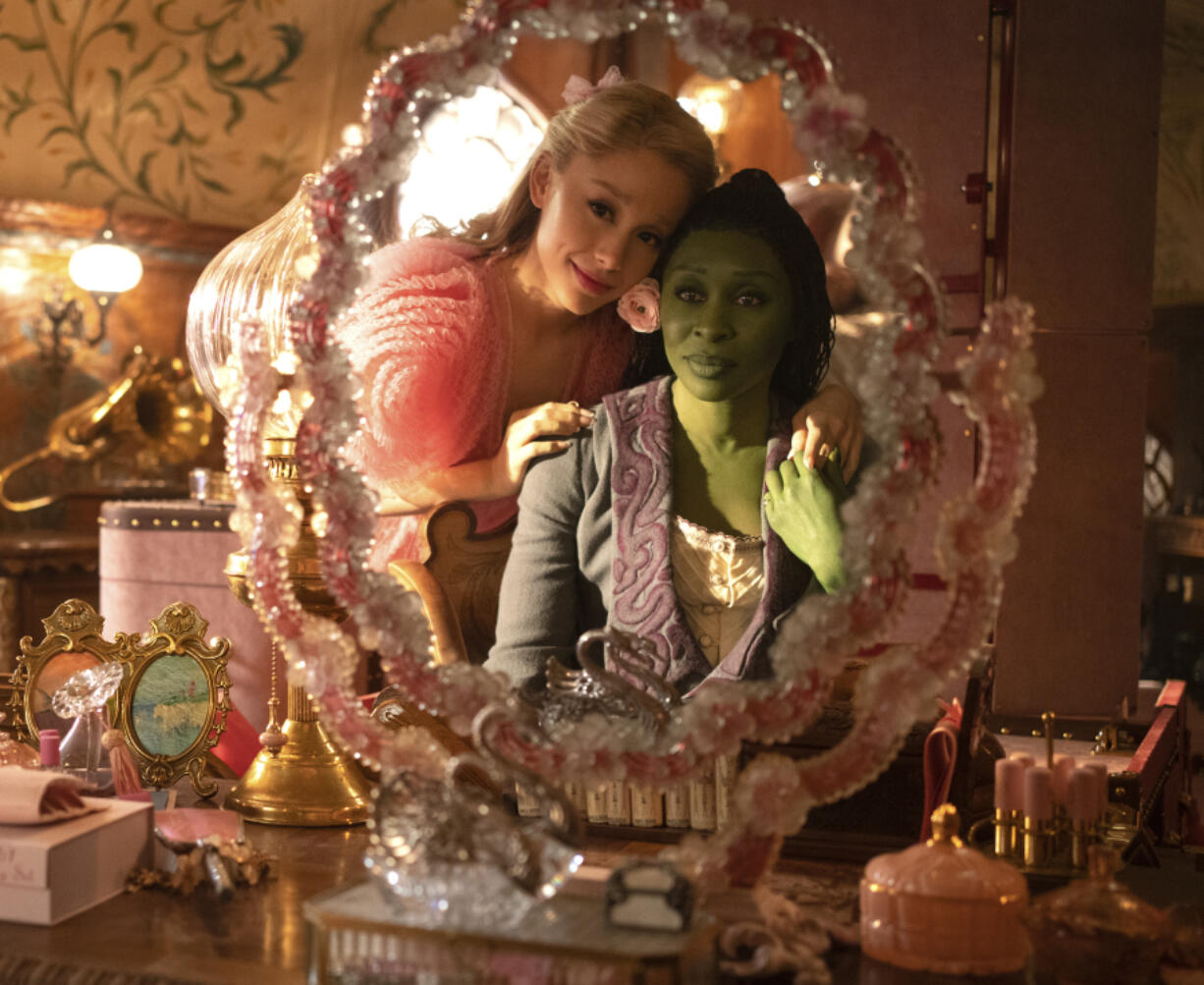 Ariana Grande, as Glinda, left, and Cynthia Erivo, as Elphaba, in a scene from the film &ldquo;Wicked.&rdquo; (Universal Pictures)