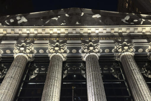 The facade of the New York Stock Exchange is illuminated on Tuesday, Nov. 19, 2024.