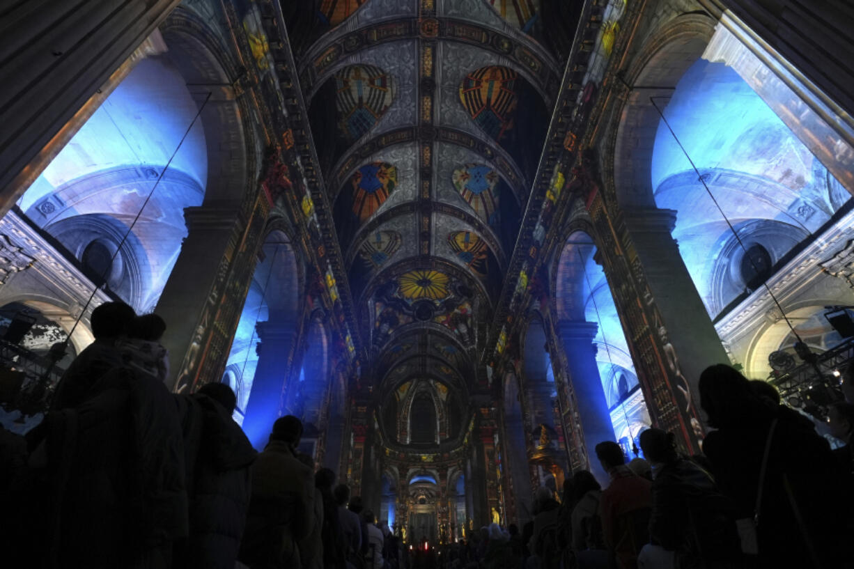 Video projections are seen Oct. 31 at the Saint-Sulpice church in Paris.