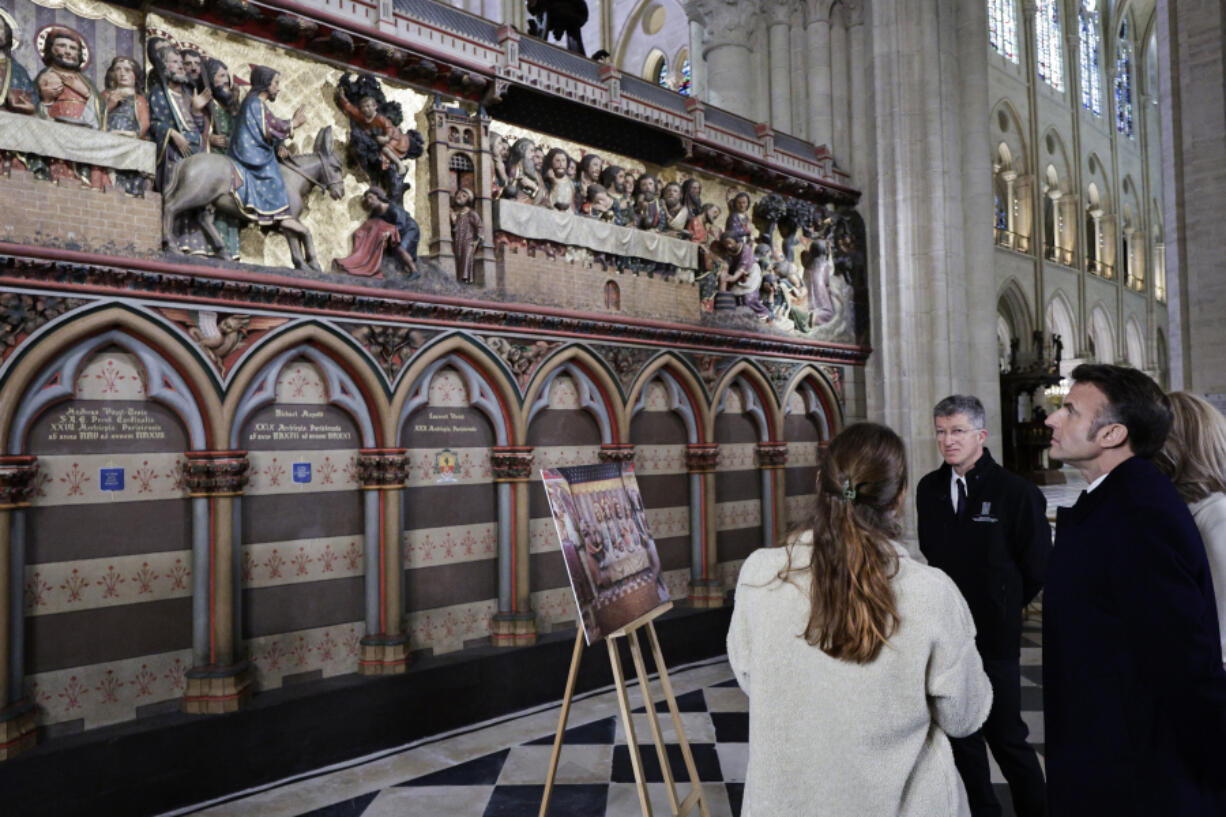 French President Emmanuel Macron visits the renovated interiors of Notre-Dame de Paris cathedral Nov. 29, 2024, in Paris.