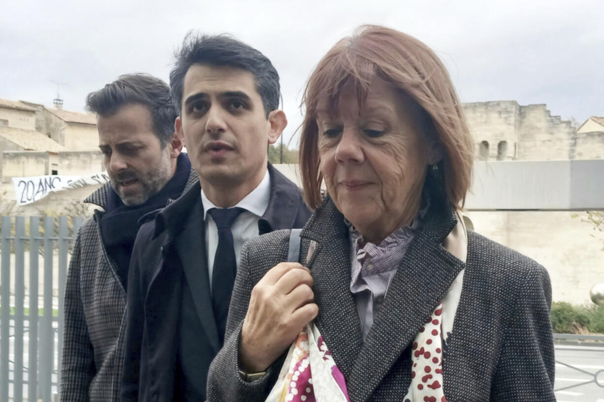 Gisele Pelicot, right, arrives with lawyers Antoine Camus, left, and St&eacute;phane Babonneauat the palace of justice after a break Monday, Nov. 25, 2024 in Avignon, southern France, after the prosecutor asked for the maximum possible penalty for aggravated rape, 20 years, against Gis&egrave;le Pelicot&#039;s now ex-husband Dominique Pelicot.