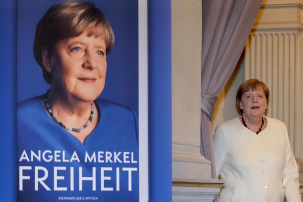 Former German Chancellor Angela Merkel arrives for the presentation of her memories in Berlin, Germany, Tuesday, Nov. 26, 2024. Book title reads &ldquo;Freedom&rdquo;.