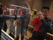 The choir &ldquo;Nueva Inspiraci&oacute;n&rdquo; plays during the Spanish-language Mass at St. Mary&rsquo;s Catholic Church on Saturday, Oct. 19, 2024, in Worthington, Minn.