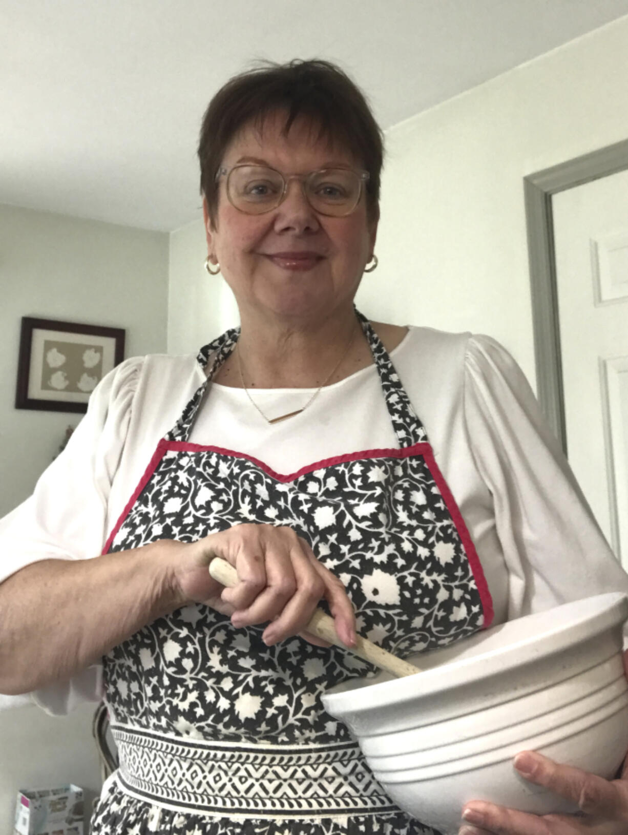 Deborah Reinhardt, a St. Louis author and food blogger at &ldquo;Three Women in the Kitchen,&rdquo; proudly wears the apron her daughter gave her.