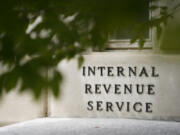 FILE - A sign is displayed outside the Internal Revenue Service building May 4, 2021, in Washington. On Friday, Aug. 19, 2022.