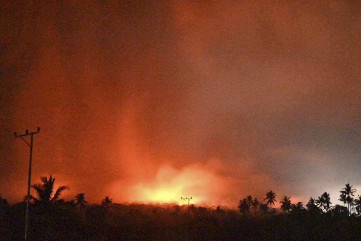 In this photo made available by Indonesia&rsquo;s Center for Volcanology and Geological Disaster Mitigation Agency (PVMBG) of the Ministry of Energy and Mineral Resources, the sky glows from the eruption of Mount Lewotobi Laki-Laki early Monday, Nov. 4, 2024, in East Flores, Indonesia.